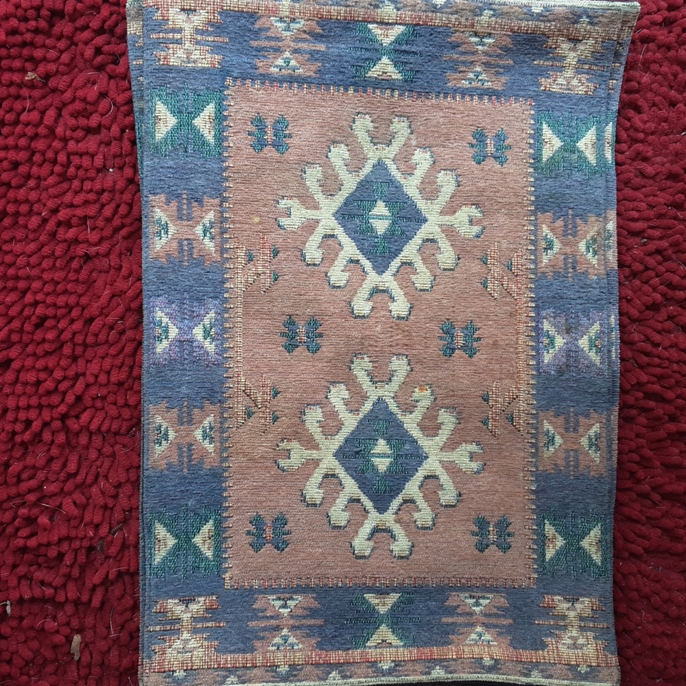 4 decorative cloth place setting,, blue and orange pattern, rectangle.